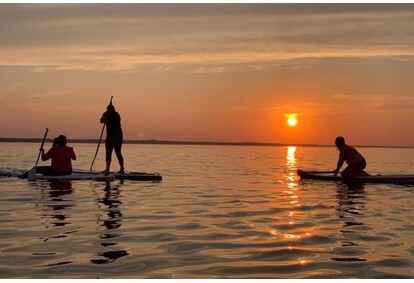 Поездка на закате с SUP-доской на озеро Буртниеку для двоих